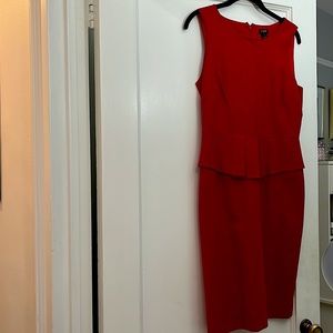 JCrew sheath with figure-flattering peplum. Available in black & red